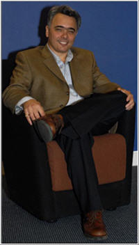 Charlie Collura relaxing in chair