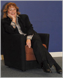 Leonora Gregory-Collura relaxing in chair